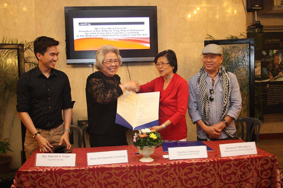 Daisy Ann Gonzales Cumming donating artwork to the National Commission for Culture and the Arts